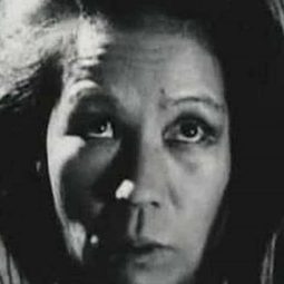 中川芳江 飾演 Custodian's Wife