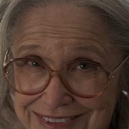 Marilyn Brett 飾演 Woman