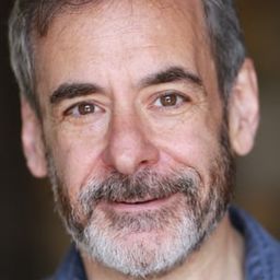 Mark Nelson 飾演 Roman