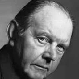 Fernand Ledoux 飾演 Frugebelle, l'académicien collabo