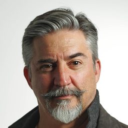 Brian Breiter 飾演 Teacher