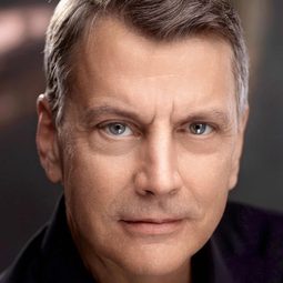 David Chrisman 飾演 TV Reporter