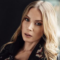 Lee Tomaschefski 飾演 Patricia Breen News Anchor