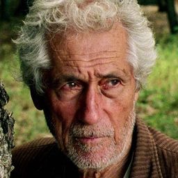 Emin Ceylan 飾演 Dede (as M. Emin Ceylan)