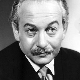 David Kossoff 飾演 Dr. Littauer