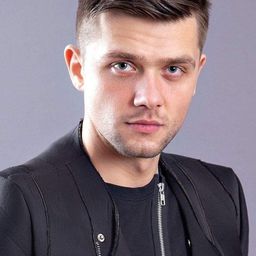 Marian Olteanu 飾演 Ernest