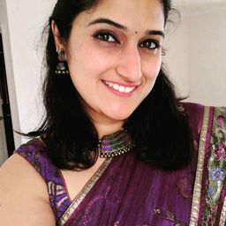 Amrutha Karagada 飾演 Divya