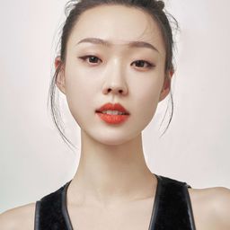 管樂 飾演 秀秀