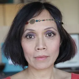 Espérance Pham Thai Lan 飾演 Femme