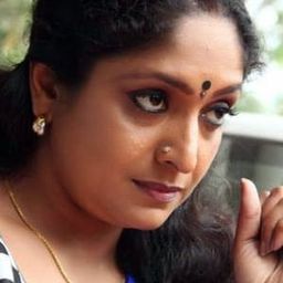 Sreelakshmi 飾演 Madhavi's Mother