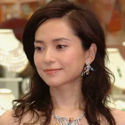 郭羨妮 飾演 Kam Ching