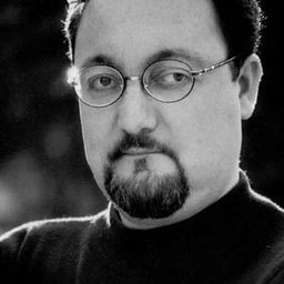 Miguel Alcíbar 飾演 El gordo