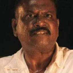 Arun Alexander 飾演 Elango