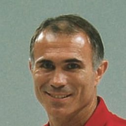 Bill Wallace 飾演 Benny Garrucci