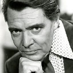 John Herbert 飾演 Rudolf Fluegel