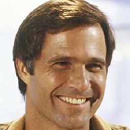 Gil Gerard 飾演 Neil Thomas Jr