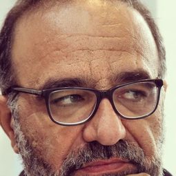 Farid Ghobadi 飾演 Reza's colleague