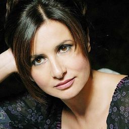 Eleonora Mazzoni 飾演 Signora Bugamelli