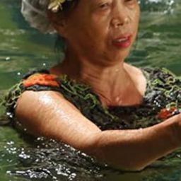 張美娥 飾演 Broker