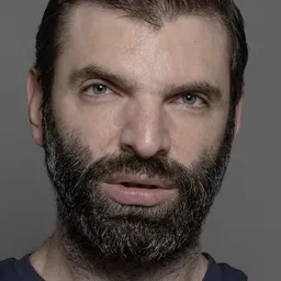 Ioachim Ciobanu 飾演 The Priest