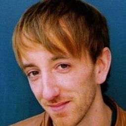 Chris Ratz 飾演 Donut Shop Cashier