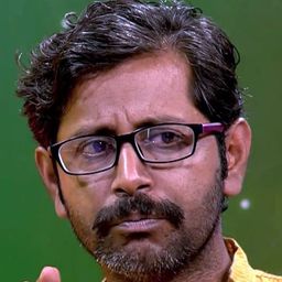 Rajesh Sharma 飾演 Pappy