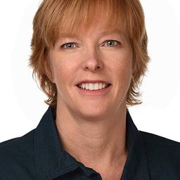 Janet Hilliard 飾演 Coroner