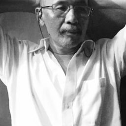 Ikun Sri Kuncoro 飾演 Pak RT