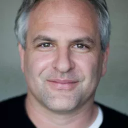 艾瑞克·席格 飾演 John Belushi