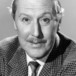 Robert Coote 飾演 Capt. Wunderlich