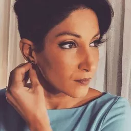 瑪雅·莎拉 飾演 Rita