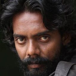 Ramachandran Durairaj - 英勇讚曲演員 飾演Arivu