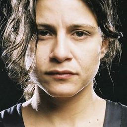 Georgette Fadel 飾演 Woman in Bus