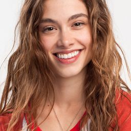 Sarah Davenport 飾演 Regan