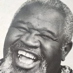 Henricão 飾演 Pai João