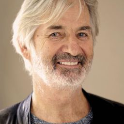 John Jarratt 飾演 Mick Taylor