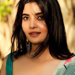 Madhuri Jain 飾演 Aditi