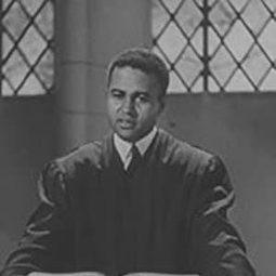 Carlton Moss 飾演 Minister