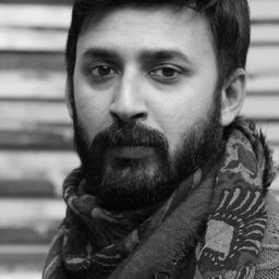 Manoj Kumar Pramanik 飾演 Mizan