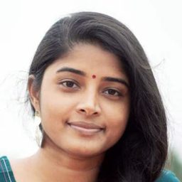 希拉·拉吉庫瑪 飾演 Thenmozhi