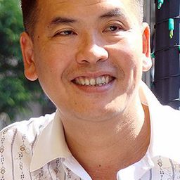 Hữu Nghĩa 飾演 Mr. Tam