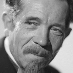 Pierre Larquey 飾演 Mr. Drain