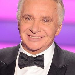 Michel Sardou 飾演 Thomas Crosky, dit Cross