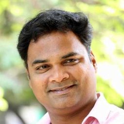 Madhunandan 飾演 Karthik's friend