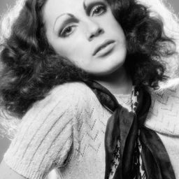 Holly Woodlawn 飾演 Self (uncredited)