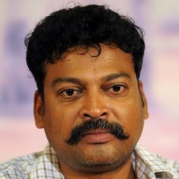 約翰·維傑 飾演 Dharmarajan