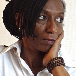 Mylène Wagram - 暗影王者演員 飾演Songolo