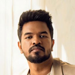 Madan Gowri 飾演 