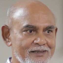 Mano Maniam 飾演 Monk