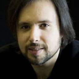 Constantinos Carydis 飾演 Conductor